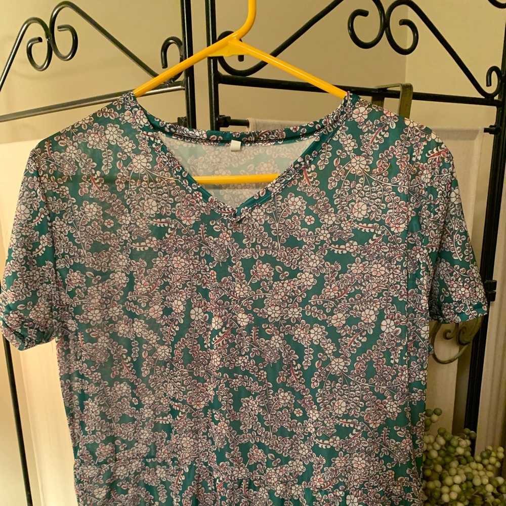 New and never worn. Knee length. Feels handmade